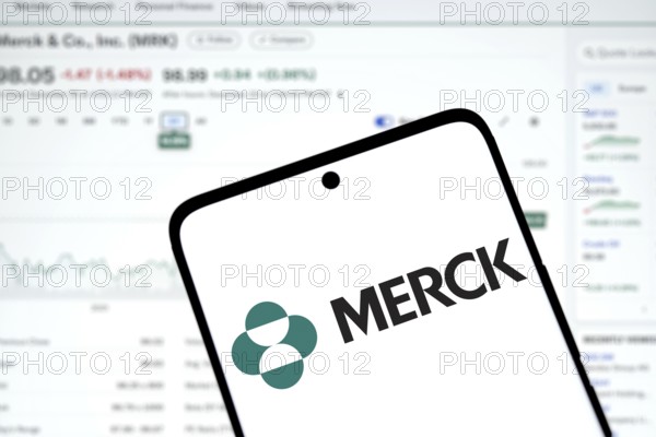 Merck logo is displayed on smartphone. Merck & Co Inc is an American multinational pharmaceutical company.