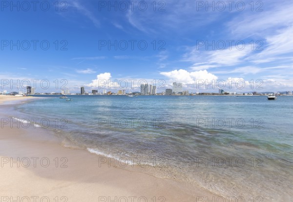 View from Deer Island, Isla de Venados, of famous Mazatlan sea promenade El Malecon, with ocean lookouts, luxury hotels, beaches and scenic landscapes