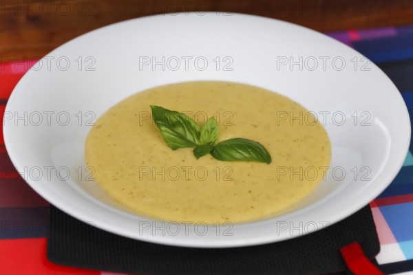Swabian cuisine, potato soup, soup dish, typical Swabian, traditional cuisine, grandmother's kitchen, basil leaves, food photography, studio, Germany
