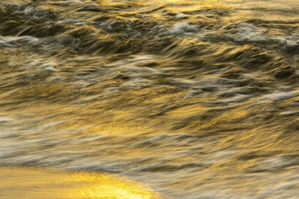 Waves at sunset on the west beach of Fischland-Darß-Zingst, Baltic Sea, Ahrenshoop, Mecklenburg-Western Pomerania, Germany