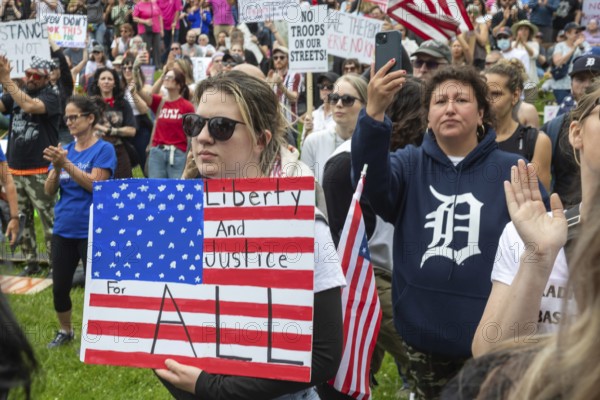 Detroit, Michigan USA - 14 June 2025 - Thousands gathered for a 'No Kings' rally, protesting President Trump's actions against immigrants and against democratic institutions
