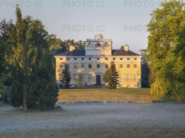 Wörlitz Castle in Wörlitz Park in the morning with fog, Garden Kingdom Dessau-Wörlitz, Wörlitz, Saxony-Anhalt Germany