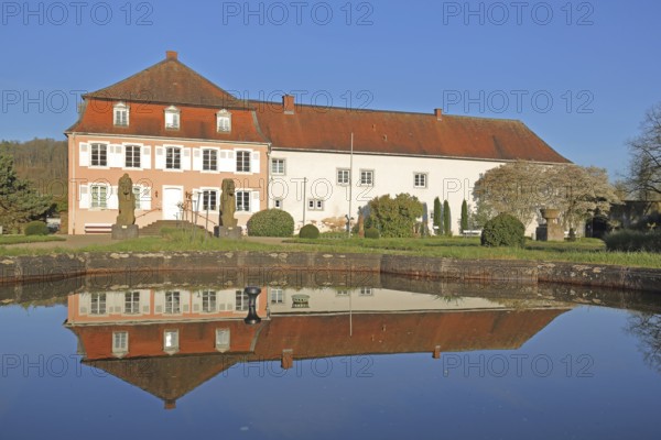 Historic noble house of the Roman Museum with Roman equestrian statues and reflection in the water, antique equestrian figure, Roman open-air museum, Roman Museum, Schwarzenacker, Homburg, Saarland, Germany
