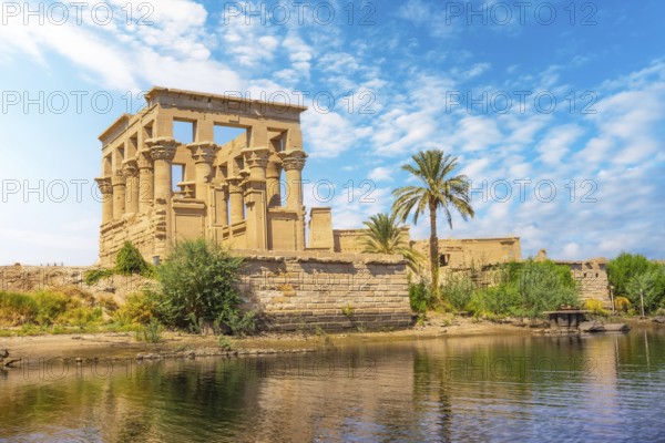 The beautiful temple of Philae and the Greco-Roman buildings seen from the Nile river, a temple dedicated to Isis, goddess of love. Aswan. Egyptian