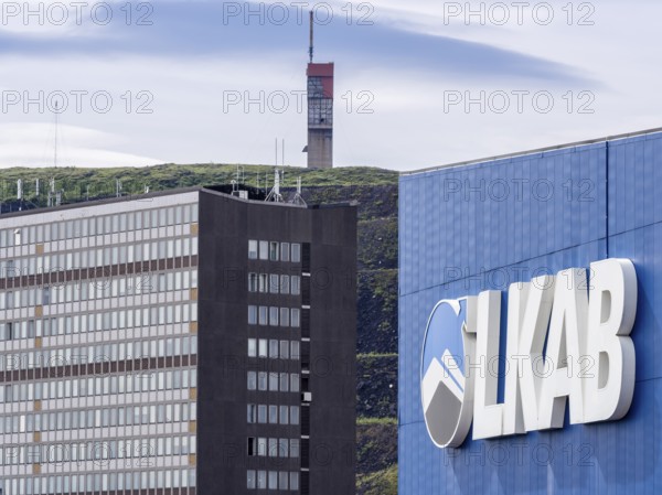 LKAB mining area, large LKAB company sign on building, mining tower in the back, Kiruna, Sweden