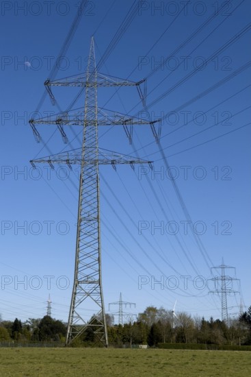 Overhead lines Power lines High-voltage lines Overhead electric lines on overhead line mast Power mast High-voltage mast Support mast in open field, Germany