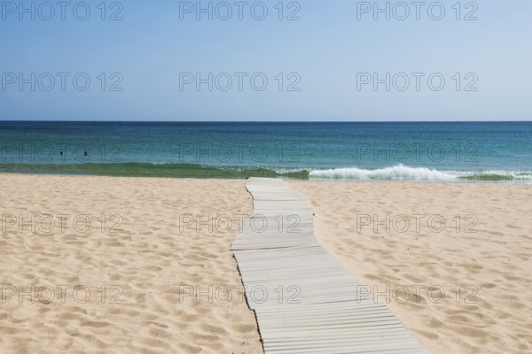 Sandy beach beach and blue sea, Spiaggia di Su Portu, Torre di Chia, Chia, south coast, Sardinia, Italy