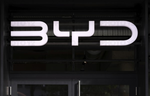 Logo in front of showroom, sales exhibition of the car brand BYD Build Your Dreams, e-vehicles, electric vehicles, Stuttgart, Baden-Württemberg, Germany