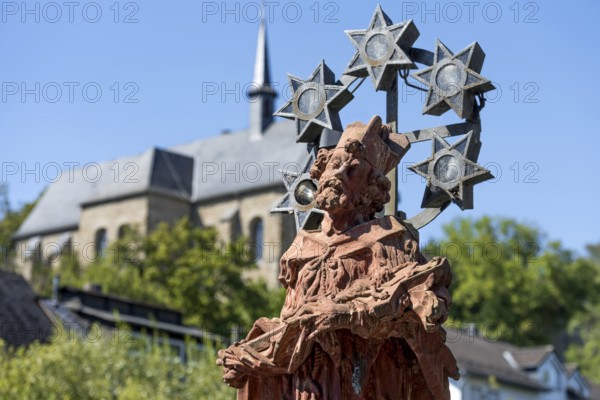 Statue of St Nepomuk, Baroque bridge saint, Nepomuk Bridge, Stone Bridge, Elbbach Bridge, above Mönchsberg with Ägidienkirche, Old Town, Hadamar, Limburg-Weilburg, Westerwald, Hesse, Germany