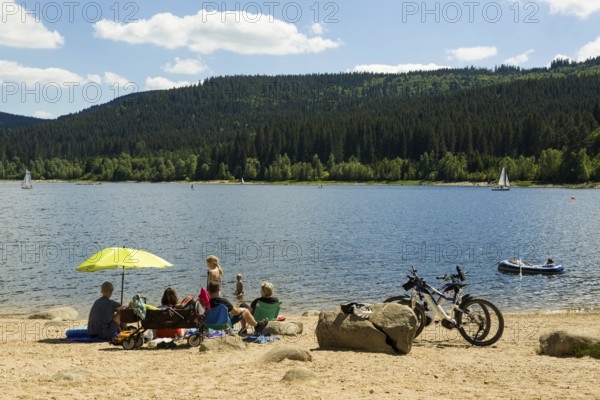 Lake in the mountains and beach in summer, Schluchsee, Black Forest, Baden-Württemberg, Germany