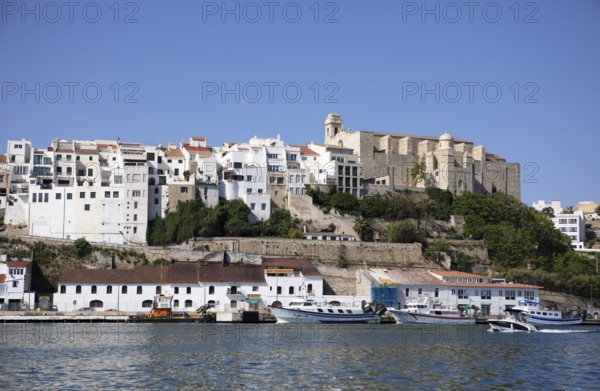 Old town and boats in the natural harbour of Mao, Mahon, Menorca, Spain