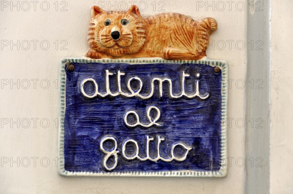 Glazed ceramic warning sign attenti al Gatto, caution cat, Gaeta, Tyrrhenian Sea, Latina, Lazio, Italy