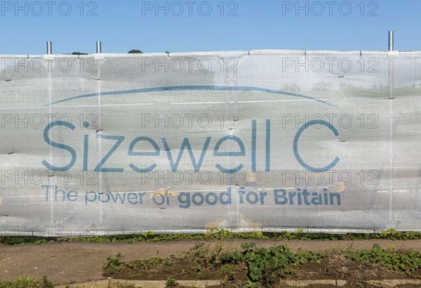 Sizewell C power station construction site screen for staff park and ride site, Wickham Market, Suffolk, England, UK