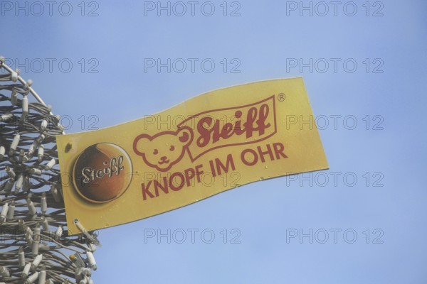 Trademark with inscription Button in ear by Steiff, Steiff animal, teddy bear, plush toy, brand name, make, emblem, cut-out, plaque, Steiff Museum, Giengen an der Brenz, Swabian Alb, Baden-Württemberg, Germany