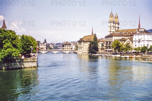 Historic buildings and cathedral bridge on the Limmat in the city centre, Zurich, Switzerland, Europe 1950s