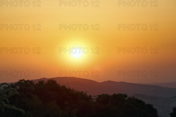 Sunset over mountain range, Sierras Subbeticas Natural Park, near Zuheros, Cordoba province, Cordoba, Andalusia, Spain