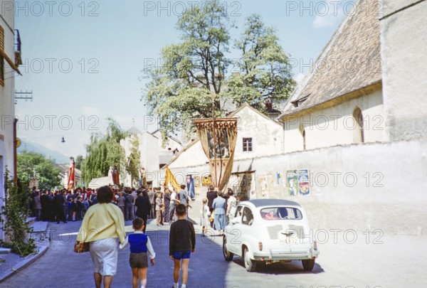 Captioned as 'Italy Corpus Christi' village Feast of Corpus Christi procession, Christian religious event, unspecified location in Italy, Europe 1959