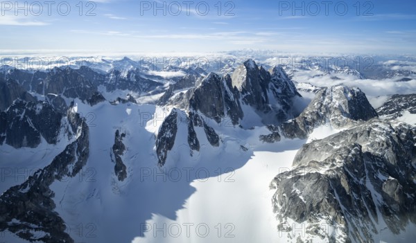 Rock cliffs, snow and ice, epic mountains with glaciers, aerial view, Alaska Range, Denali National Park, Alaska, USA