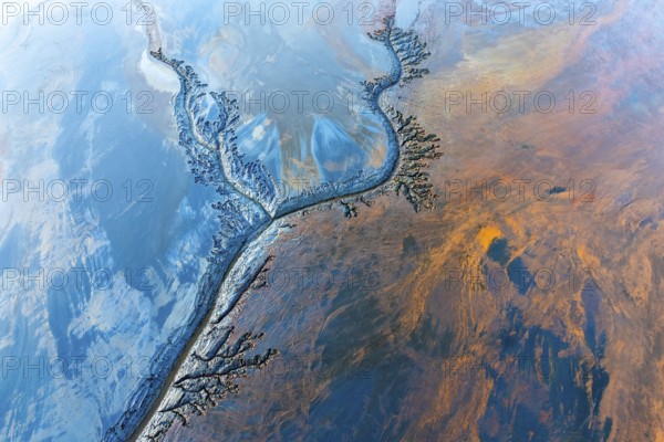 An entrancing abstract fractal piece showcasing intricate patterns and vivid color contrasts. The harmonious blend of shapes offers a stunning visual experience