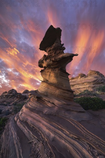 Stunning sunset with fiery skies illuminating the unique rock formations of Coyote Buttes in the Paria Canyon-Vermilion Cliffs in Arizona