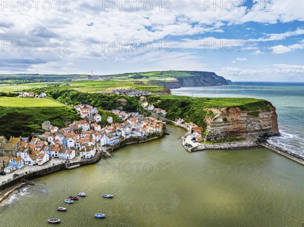 Staithes Village from a drone, North Yorkshire, North York Moors National Park, England, United Kingdom