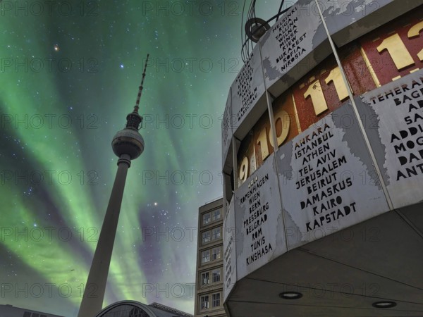 Fascinating polar lights, edited, above the Berlin World Clock and the Berlin TV Tower at night, Alexanderplatz, Alex, Mitte, Berlin