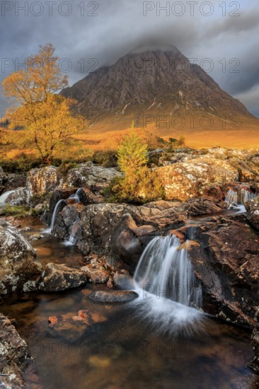 Waterfall, wild river, cloudy mood, morning light, autumn colours, autumn, mountains, Buachaille Etive Mòr, Glencoe, Scottish Highlands, Scotland, Great Britain