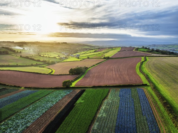 Colours of autumn Fields and Farms over Sheldon from a drone, Torbay, Devon, England, United Kingdom