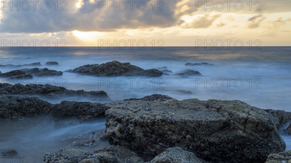 Sunrise on the beach, coast near Sadah, Oman