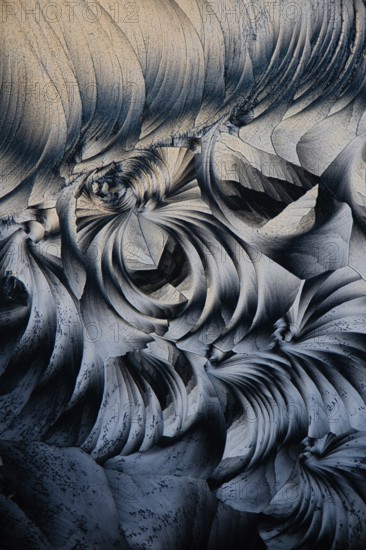 Captivating image showcasing the intricate textures and patterns of Salicylic acid microcrystals under a microscope, highlighting its delicate structure