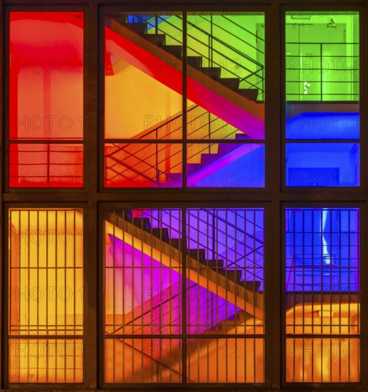 View through the windows of a brightly lit staircase. Frankfurter Mainova AG building, city center, Frankfurt am Main, Hesse, Germany