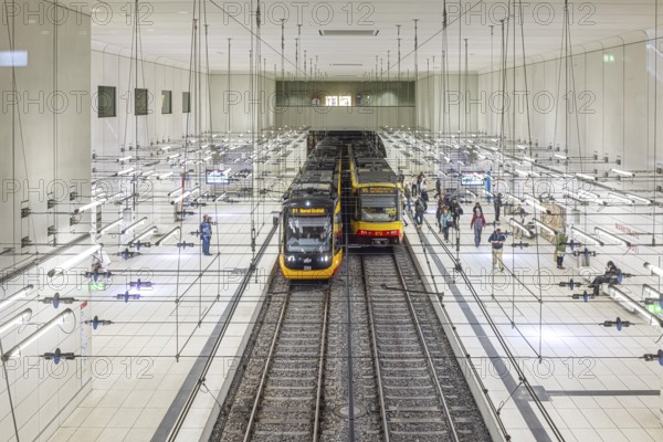 Combined solution, public transport in Karlsruhe. Realignment of trams and light rail in the city centre. The aim of the project is to make local transport more effective and to relieve the city centre of cars. Marktplatz stop (pyramid) . Karlsruhe, Baden-Württemberg, Germany