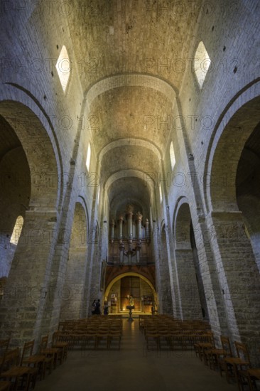 View of the entrance and the organ in the abbey of Gellone, also Saint-Guilhem-le-Désert monastery, Département Hérault, France