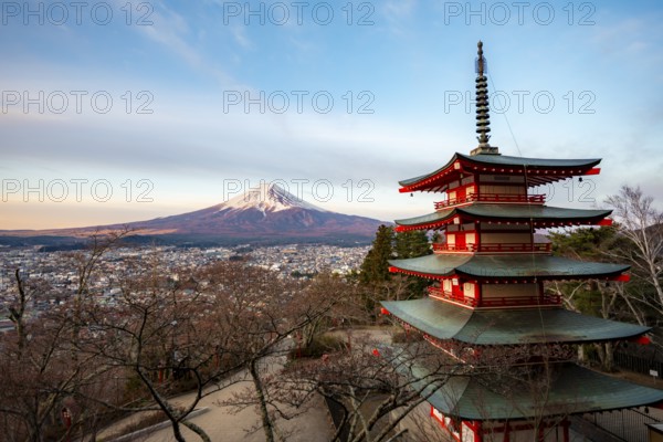 Five-story pagoda of a Shinto Shrine, Chureito Pagoda, with views of Fujiyoshida City and Mount Fuji volcano at sunrise, Arakura Fuji Sengen Shrine, Arakurayama Sengen Park, Yamanashi Prefecture, Japan