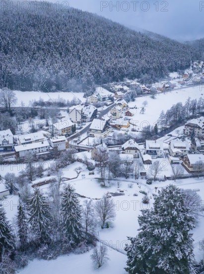 Snowy landscape with village and wooded scenery, Enzklösterle, district of Calw, Black Forest, Germany