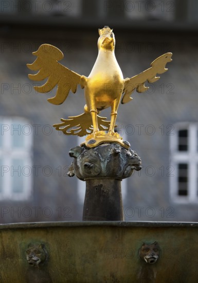 Gilded imperial eagle as a fountain eagle on the market fountain, Old Town, Goslar, UNESCO World Heritage Site, Lower Saxony, Germany