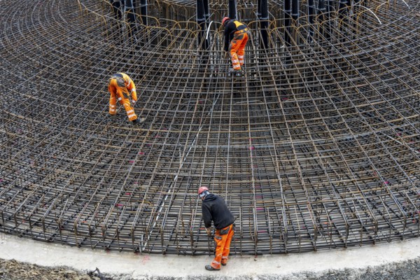 Assembly of reinforcing steel for the reinforced concrete foundation of a wind turbine, a mesh of rebar and rebar mesh, over 100 tons of reinforcing steel were used, the wind turbine will have a hub height of 160 meters, part of a new wind farm in Sauerland, near Balve, North Rhine-Westphalia, Germany