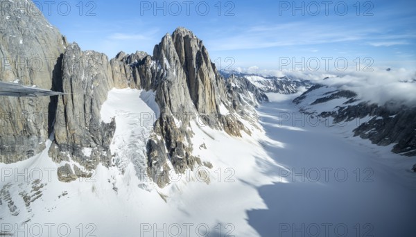 Cliffs, Kichatna Spires, snow and ice, epic mountains with glaciers, aerial view, Alaska Range, Denali National Park, Alaska, USA