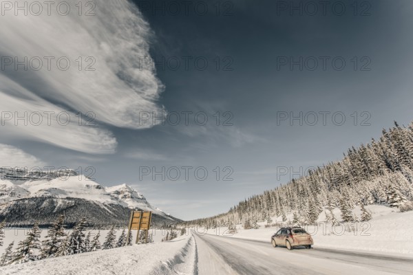 Winter road trip on the Icefields Parkway with lots of snow and ice, Banff National Park, Jasper National Park, Alberta, Canada