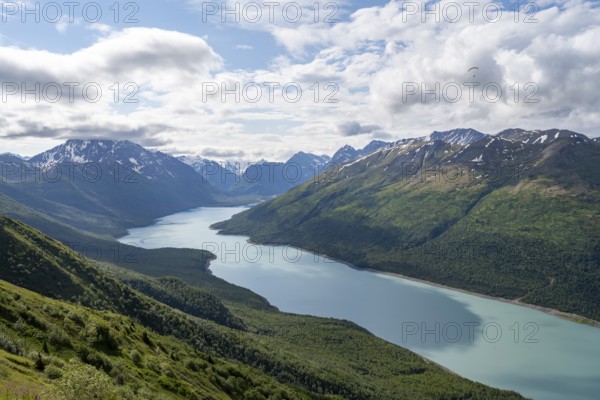 View of blue lake and mountains on Twin Peaks Trail, Eklutna Lake, Chugach Mountains, Chugach State Park, Alaska, USA
