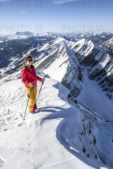 Ski tourers at the summit, mountains in winter, Sonntagshorn, Chiemgau Alps, Bavaria, Germany