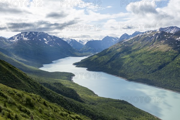View of blue lake and mountains on Twin Peaks Trail, Eklutna Lake, Chugach Mountains, Chugach State Park, Alaska, USA