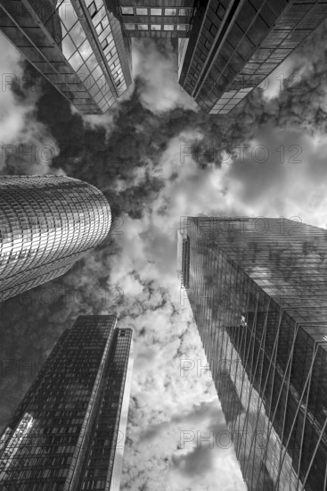 Office skyscrapers, cloudy sky, La Défence, largest office building district in Europe, black and white, Paris, France