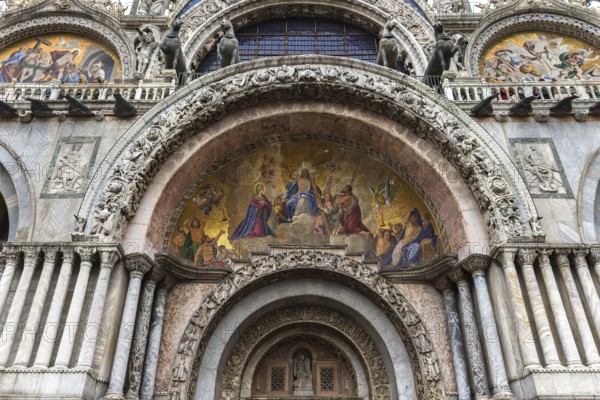 Entrance portal with mosaic of the Basilica di San Marco, built in the 11th century, Venice, Veneto, Italy