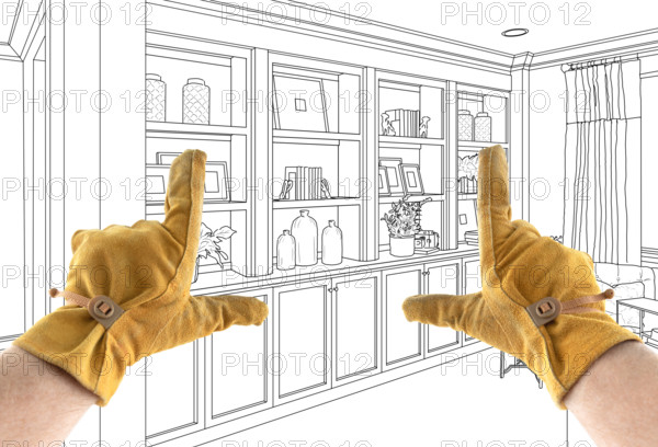 Male Contractor Hands Framing Over Built In Design Drawing