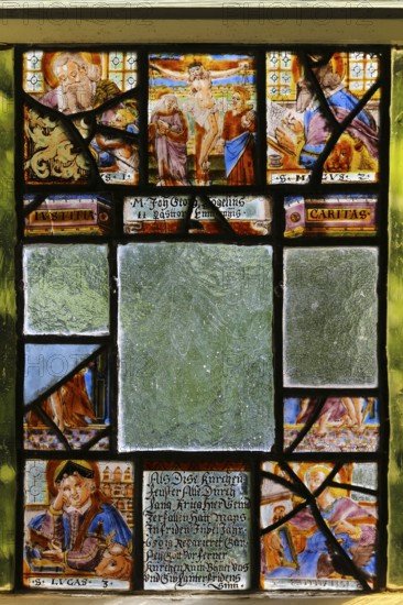 Parts of a church window, historical and partly destroyed church window, Protestant St. Andrew's Church, Eningen unter Achalm, Baden-Württemberg, Germany