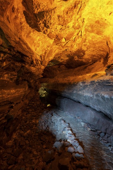 Underground cave formed by lava flow, illuminated lava tunnel, Cueva de los Verdes, Lanzarote, Canary Islands, Spain