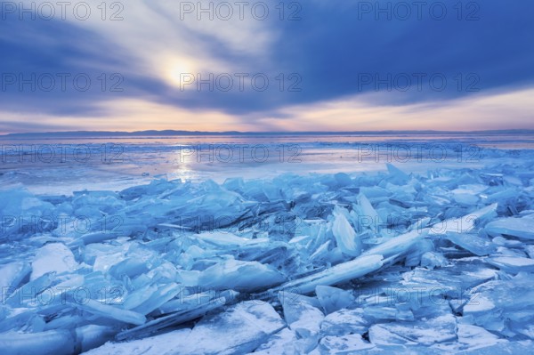 Lake Baikal is located in southern Siberia, Russia, near the city of Irkutsk. It is the deepest lake in the world, with a maximum depth of about 1, 642 meters (5, 387 feet), and the largest freshwater lake by volume, containing roughly 20% of the world's surface freshwater. Its surface area spans approximately 31, 500 km² (12, 200 sq mi). Baikal is a unique ecosystem, home to hundreds of endemic plant and animal species, including the famous Baikal seal, and plays a crucial role in the region's climate and biodiversity. Due to its outstanding natural significance, it was designated a UNESCO World Heritage Site in 1996