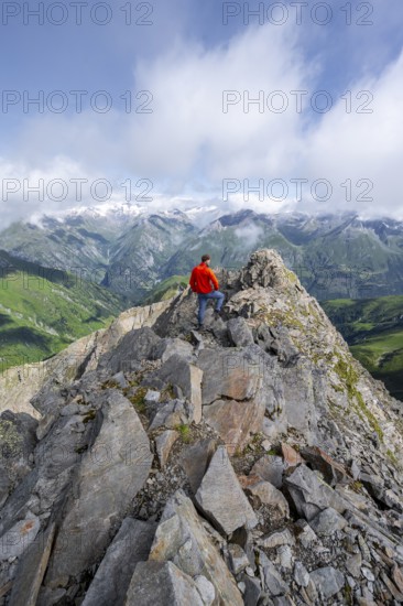 Mountaineer on the summit of Lasörling, view of the mountain panorama of the Venediger Group, Lasörling Group, Hohe Tauern National Park, East Tyrol, Tyrol, Austria