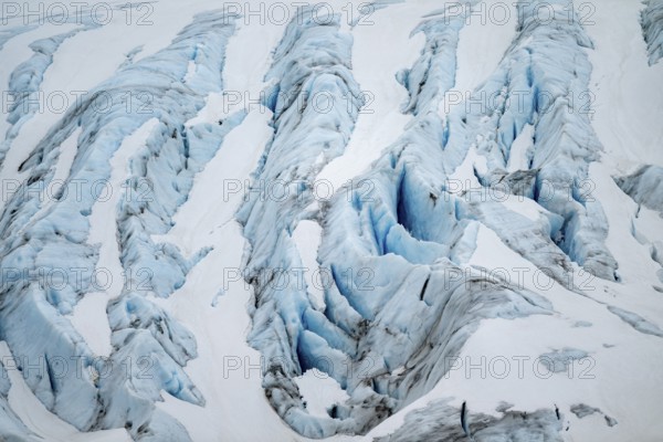 Blue rugged glacier ice with crevasses and snow, detail, Exit Glacier, Kenai Peninsula, Alaska, USA
